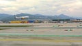 BARCELONA, SPAIN, APRIL 30, 2016: White Plane Landing On Airport Runway