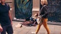 BARCELONA, SPAIN - APRIL, 15, 2017. Young beggar in the street