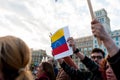 Barcelona, Spain - 30 april 2019: young venezuelan man hold venezuelan flag in