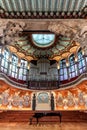 Interior of the Palau de la Musica Cataluna, showcasing its beautiful art deco design