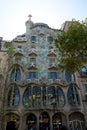 BARCELONA, SPAIN - AUG 30th, 2017: The curving shaped stone facade of Gaudi`s Casa Batllo, outdoor view on a sunny day Royalty Free Stock Photo