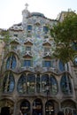 BARCELONA, SPAIN - AUG 30th, 2017: The curving shaped stone facade of Gaudi`s Casa Batllo, outdoor view on a sunny day Royalty Free Stock Photo