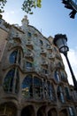 BARCELONA, SPAIN - AUG 30th, 2017: The curving shaped stone facade of Gaudi`s Casa Batllo, outdoor view on a sunny day Royalty Free Stock Photo