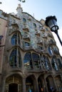 BARCELONA, SPAIN - AUG 30th, 2017: The curving shaped stone facade of Gaudi`s Casa Batllo, outdoor view on a sunny day Royalty Free Stock Photo