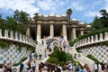 BARCELONA, SPAIN - AUG 30th, 2017: Entrance at the Park Guell designed by Antoni Gaudi with tourists at the stairs