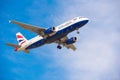 BARCELONA, SPAIN - AUGUST 20, 2016: British Airways plane in the blue sky. Copy space for text. Royalty Free Stock Photo
