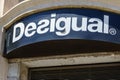 Barcelona, Spain - August 1, 2021.Logo and facade of Desigual, a Spanish company in the fashion industry characterized by its