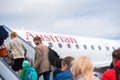 BARCELONA, SPAIN - AUGUST 20, 2016: Passengers enter the plane. Austrian Airlines. Copy space. Royalty Free Stock Photo