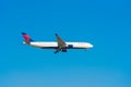 BARCELONA, SPAIN - AUGUST 20, 2016: The plane of the American airline Delta in the blue sky. Copy space for text.