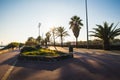 Barcelona, Spain - 05.12.2018: Beautiful sunset seen from a street with many palm trees Royalty Free Stock Photo