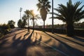 Barcelona, Spain - 05.12.2018: Beautiful sunset seen from a street with many palm trees Royalty Free Stock Photo