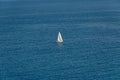 Barcelona, Spain - 18.08.2019: Beautiful white sailing yacht in the blue huge sea