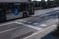 Barcelona, Spain: Bus on the road with zebra crossing sign Eco Bus Electric