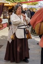 Barcelona, Spain - December 26, 2021. Musicians playing the dulzaina, a double reed wind instrument belonging to the oboe family.