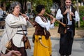 Barcelona, Spain - December 26, 2021. Musicians playing the dulzaina, a double reed wind instrument belonging to the oboe family.