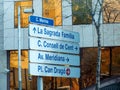 Barcelona, Spain - December 30 2012: A Street sign with directions to the La Sagrada Familia Cathedral in Barcelona, Spain Royalty Free Stock Photo