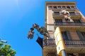Barcelona, Spain, Europe - building facade and characteristic lamp with dragon and umbrella