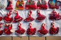 Barcelona, spain - 20 february 2020: gifts shop with souvenirs of red flamenco dancers, symbol of tourism and spanish tradition