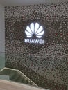 Barcelona, Spain - 26. February 2020: HUAWEI logo on the wall in HUAWEI store in Barcelona Royalty Free Stock Photo