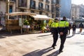 BARCELONA, SPAIN - FEBRUARY 22, 2019: Policemen patrol in the main street La Rambla of Barcelona