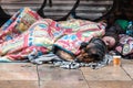 BARCELONA, SPAIN, February 4, 2018 A young homeless guy, a girl