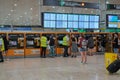 04.08.2023. Barcelona, Spain, Interior of the Barcelona Sants train station with people taking tickets and workers helping