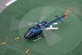 Blue helicopter flying over the city of Barcelona. Aerospatiale AS 355F-2 Ecureuil 2