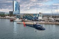 Blue helicopter flying over the city of Barcelona. Aerospatiale AS 355F-2 Ecureuil 2