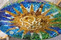 Elements of mosaic fragments Gaudi`s mosaic work in Park Guell In winter in the city of Barcelona. Royalty Free Stock Photo