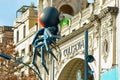 Facade of the Coliseum Cinema, decorated with a huge spider figure in Barcelona, Spain