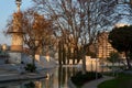 Barcelona, Spain - 19 january 2022: Panorama of Parc de l`Espanya Industrial at sunset with warm natural light and lake.