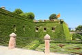 BARCELONA, SPAIN - JULY 12, 2018: Montjuic Castle with Catalan flag on the top; it is an old military fortress, with roots dating Royalty Free Stock Photo