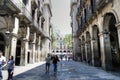 Barcelona, Spain - July 5, 2016: People walking amongst the historic buildings of Barcelona