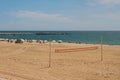Barcelona, Spain - Jun 13, 2019: Volleyball net, beach and sea Royalty Free Stock Photo