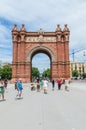 People at Arc de Triomf or Arco de Triunfo.