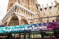 Barcelona, spain -  20 june 2019: touristic sightseeing bus in front of sagrada familia landmark cathedral, symbol of mass tourism Royalty Free Stock Photo