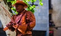 Barcelona, Spain Ã¢â¬â 2019. Man dressed as cowboy gives live statue performance at famous La Rambla street