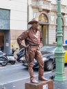 Barcelona, Spain Ã¢â¬â 2011. Man dressed as cowboy gives live statue performance at famous La Rambla street