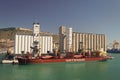 Barcelona, Spain - March 30, 2016: bulk ship Maestro with cranes in sea port. Bulk shipment. Shipping and trade activity