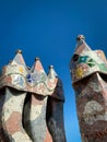 Interior of inner staircase chamber with windows and blue tiles in Casa BatllÃÂ³, designed by architect Antoni GaudÃÂ­.