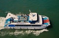 Barcelona, Spain - March 30, 2016: pleasure boat Visio submarina Trimar with people on deck in sea. Boat trip for