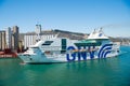 Barcelona, Spain - March 30, 2016: ship or liner GNV Rhapsody Genova in sea harbor on mountain landscape. Cruise ship