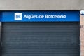 Barcelona, Spain-March 8, 2023. Sign and facade of AigÃÂ¼es de Barcelona, AigÃÂ¼es de Barcelona, the company in charge