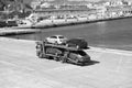 Barcelona, Spain - March 30, 2016: tow truck carry Seat and Mercedes cars in sea port. Auto export and import trade Royalty Free Stock Photo