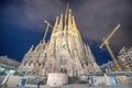 BARCELONA, SPAIN - MAY 13, 2018: Cathedral of La Sagrada Familia at night. It is designed by architect Antonio Gaudi and is being Royalty Free Stock Photo