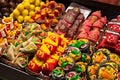 BARCELONA, SPAIN - MAY 16, 2017: Different sweets on the famous La Boqueria market in Barcelona