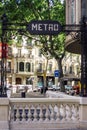 Barcelona, Spain - May 11, 2021. Modernist style sign in Urquinaona square metro station, Barcelona, Spain