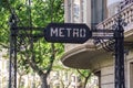 Barcelona, Spain - May 11, 2021. Modernist style sign in Urquinaona square metro station, Barcelona, Spain