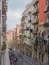 Barcelona, Spain. May 2019 : Overlooking a narrow street behind residential houses or apartments. Balconies with clothes drying on