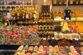 BARCELONA, SPAIN - MAY 16, 2017: Sale of different sweets, dry fruits, oils and other products on the famous La Boqueria market in